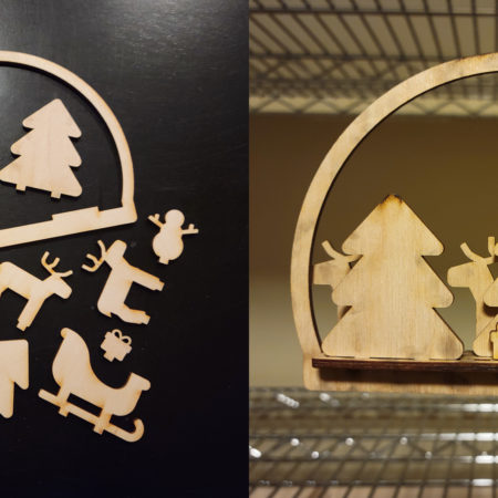 Left half is a pille of shapes such as trees, reindeer, a sleigh, a board with a bunch of holes in it, a half-circle, snowmen, and presents. The right half is an assembled ornament with vertical trees, snowman, and a sleigh in the background.